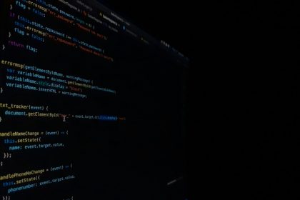 Computer monitor showing structured data on a dark screen