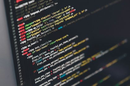 Developer monitor displaying lines of application source code