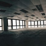 Empty office room with desks at the end of the working day