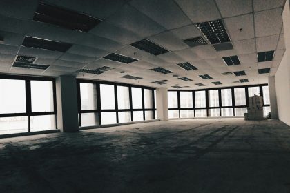 Empty office room with desks at the end of the working day